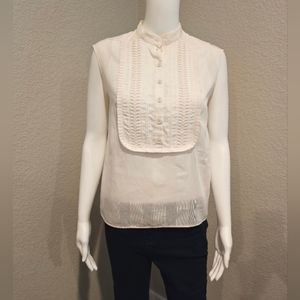 CHLOE light pink sleeveless cotton blouse.